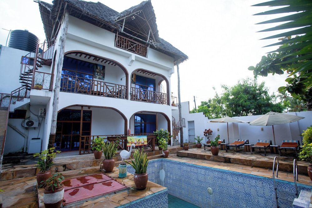 Torino - Zanzibar - Utulivu Bungalow