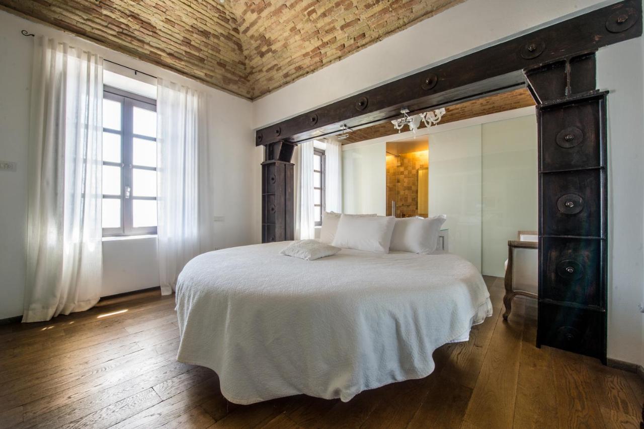 Camera da letto Faro Spartivento, Chia- Foto Booking.com